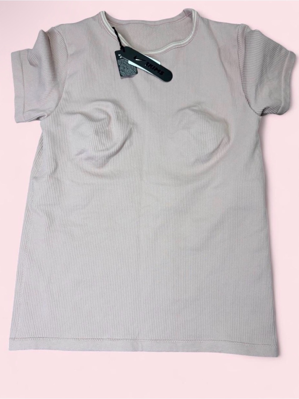 Nike x Skims Ribbed Seamless Short Sleeve Top in Himalayan Pink